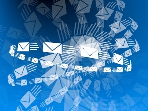 Flying swirl of envelopes and e-mail