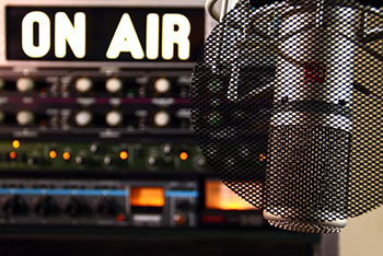 on air sign with microphone