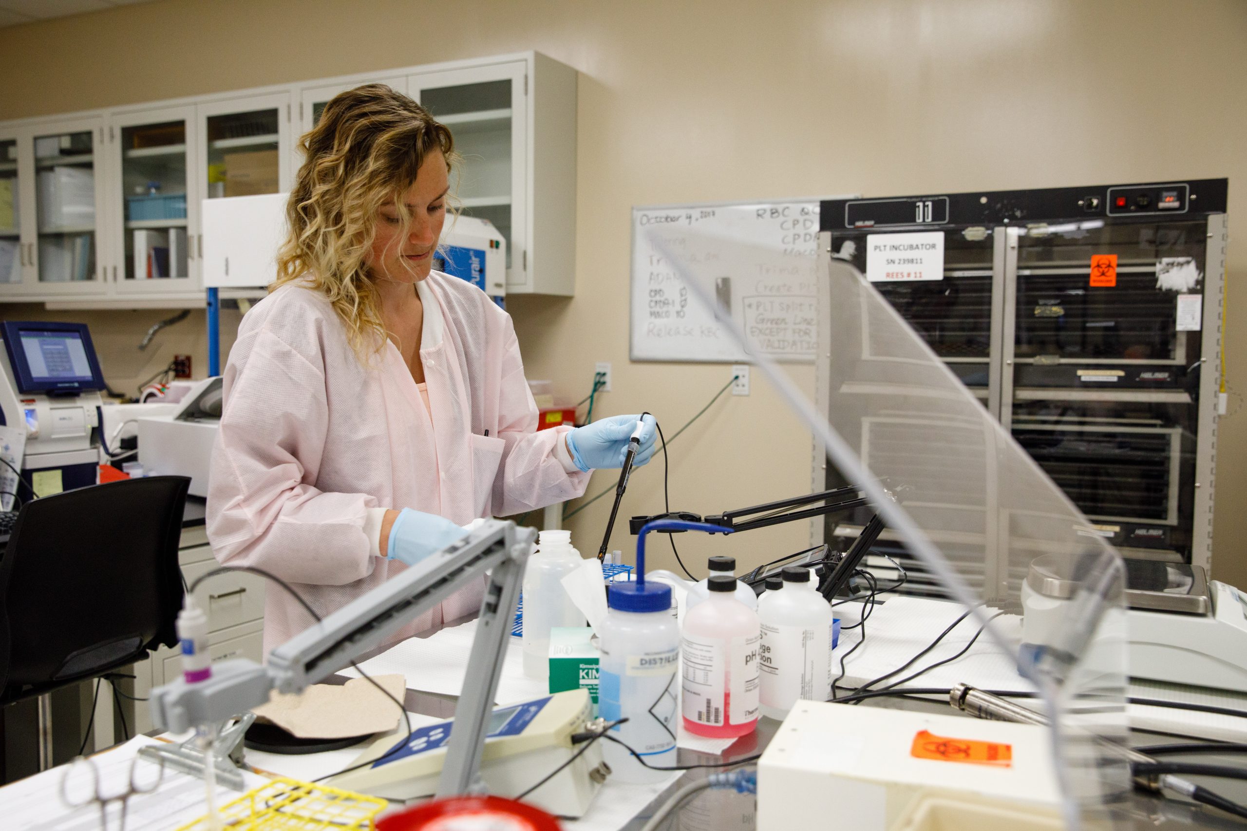 woman in blood lab