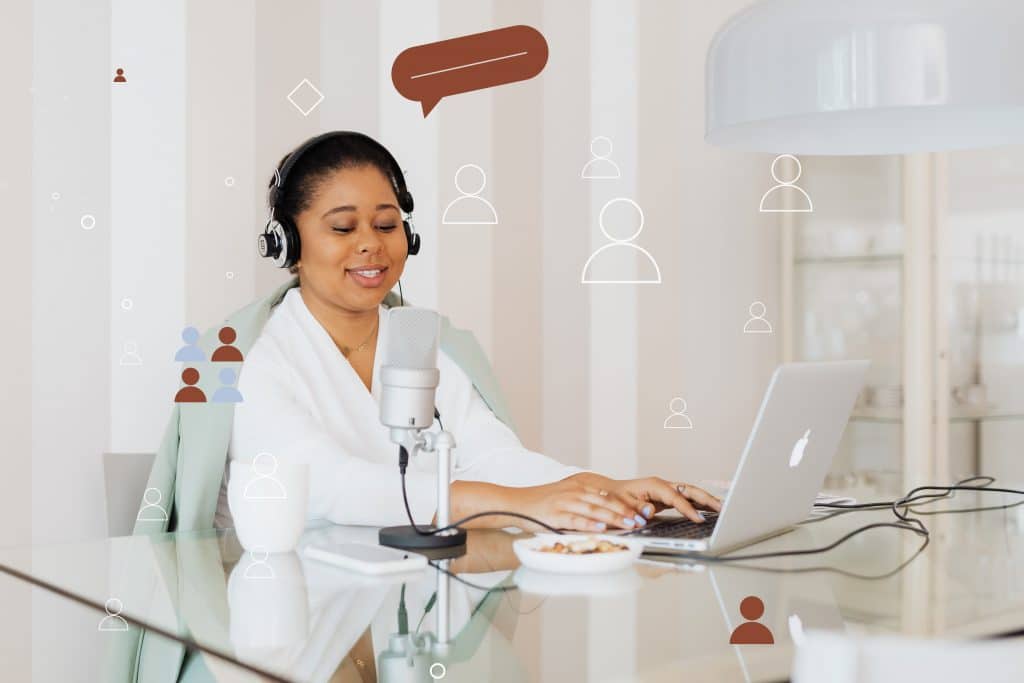 Woman professional at laptop talking into a good external microphone